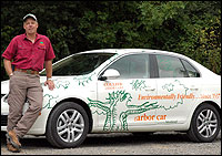 Phil Wich with the Collier Arbor Care Arbor Car which runs on bio-diesel fuel.